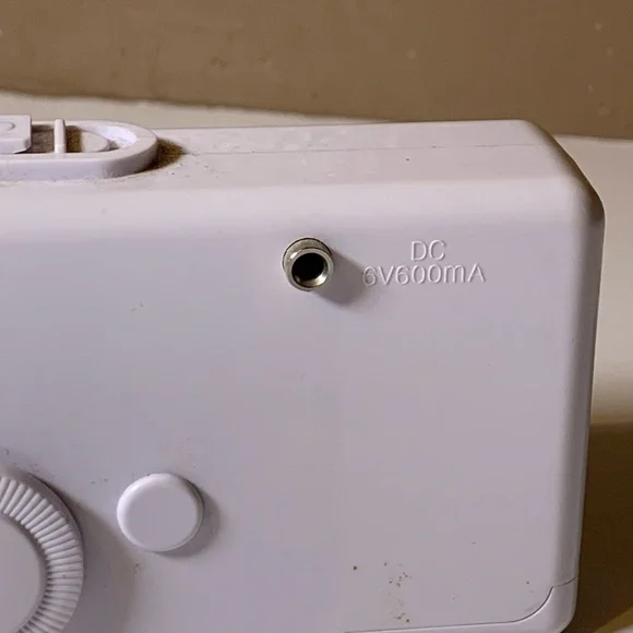 Compact White Handheld Sewing Machine - Picture 4 of 6